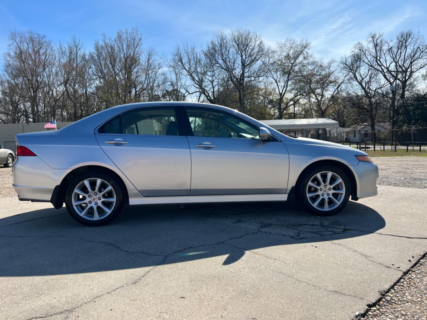 2006 Silver /Gray Acura TSX (JH4CL969X6C) with an 2.4 engine, Automatic transmission, located at 4520 Airline Hwy, Baton Rouge, LA, 70805, (225) 357-1497, 30.509325, -91.145432 - 2006 Acura TSX 2.4L 4 Cylinder, Auto, 126K Miles, Leather, Sunroof, Navigation, Power Windows, Locks & Mirrors, NO IN HOUSE FINANCING. FOR INFO PLEASE CONTACT JEFF AT 225 357-1497 CHECK OUT OUR A+ RATING WITH THE BETTER BUSINESS BUREAU WE HAVE BEEN A FAMILY OWNED AND OPERATED BUSINESS AT THE SAME - Photo#4